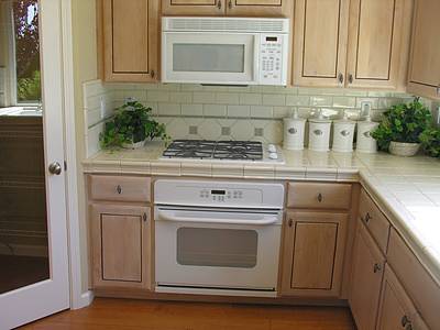 tan ceramic tile backsplash