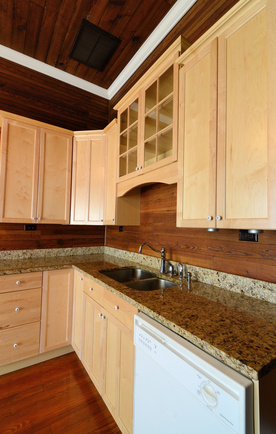 dark wood backsplash with granite countertop