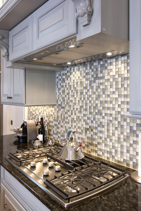 gray and white glass tile backsplash